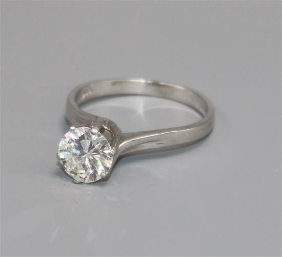 An 18ct white gold and solitaire diamond ring.